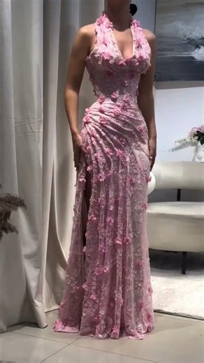 To order this blush pink floral lace dress DM A sculpted halter gown crafted in sheer lace and