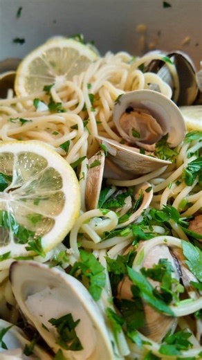 Levi eats pasta with clams, featuring razor clams! He was fascinated with the shells! #pasta #clams #toddlereats | Cooking for Levi