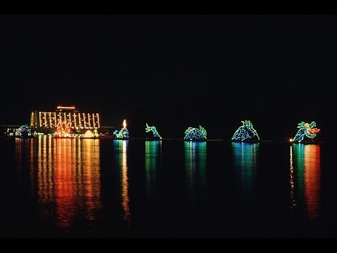 Electrical Water Pageant on the SEVEN SEAS LAGOON & BAY LAKE- Wilderness Lodge Disney World