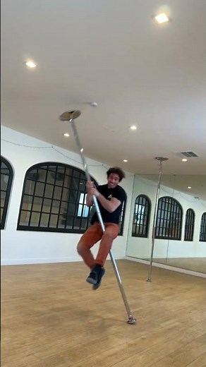 Guy Falls Down While Spinning on Pole as it Breaks - 1482135