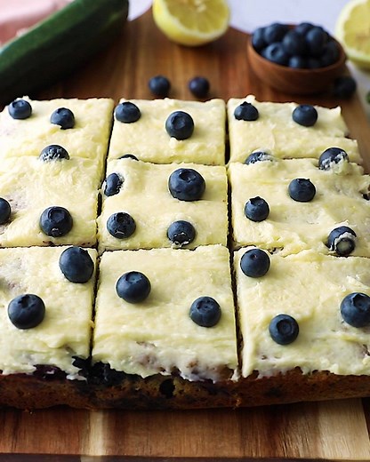 1M views · 713 reactions | GORGEOUS lemon blueberry zucchini cake with a luscious lemon frosting for #AKZucchiniWeek day 2  it's gluten free, naturally sweetened + bursting with juicy blueberries! RECIPE: https://www.ambitiouskitchen.com/lemon-blueberry-zucchini-cake/ | Ambitious Kitchen | Facebook