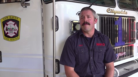 Firefighter rescues dogs stranded below cliff