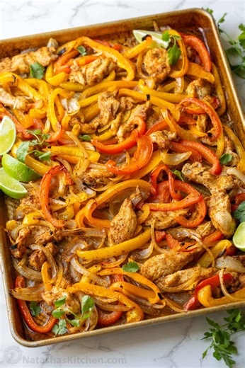 You’ll love my easy Sheet Pan Chicken Fajitas with tender chicken. Recipe: https://natashaskitchen.com/sheet-pan-chicken-fajitas/ | NatashasKitchen.com