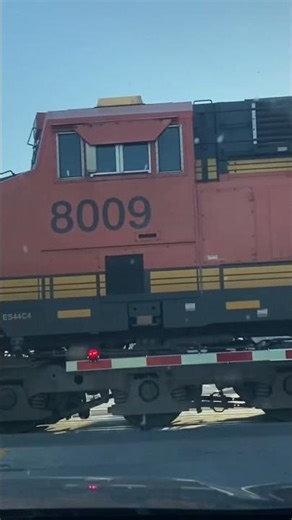 BNSF train in Prairie Du Chien, Wisconsin with a DPU at the end.