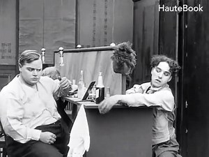 #CharlieChaplin's stealing skills are usually good. :P But this time he fails while stealing #FattyArbuckle's drink. :o ;) :) For more Chaplin comedy, visit - https://goo.gl/VSqAo9 | HauteBook