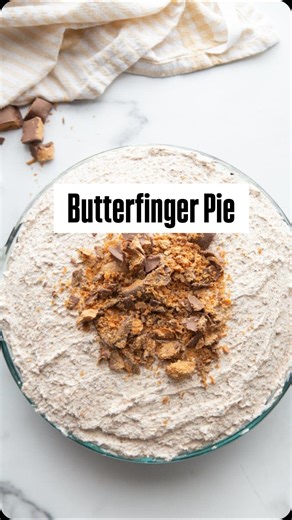 This Butterfinger Pie is a creamy and decadent pie recipe with plenty of Butterfinger candy bars swirled in. ➡️COMMENT below with the word RECIPE, and I’ll send you a clickable link to the recipe! #butterfingerpie #butterfinger #butterfingers #recipegirlpies #recipegirl https://www.recipegirl.com/butterfinger-pie/ | RecipeGirl