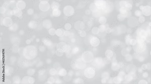 Abstract bokeh background animation with gently flickering defocused white bokeh spheres moving left to right. This simple monochrome motion background is full HD and a seamless loop.