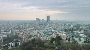 Drone flies towards Lozenets district in Bulgarian capital Sofia, beautiful urban scenery unfolds in early morning.