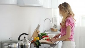 Young Woman Standing Kitchen Cutting Tomatoes Stock Footage Video (100% Royalty-free) 4332344 | Shutterstock