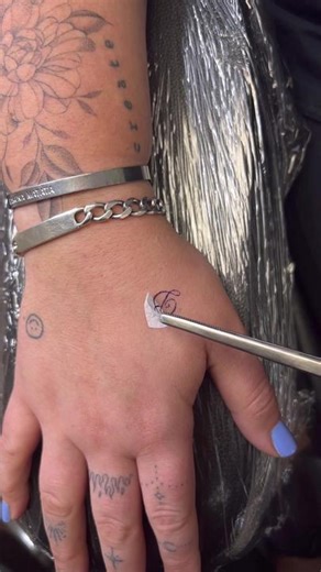 Small Fine-Line Letter D Tattoo Designs