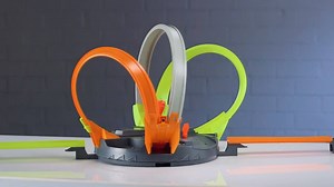 Find out what's inside the Hot Wheels Roto Revolution and learn how to assemble it with this handy video guide! The Hot Wheels Roto Revolution will test player's skills in a head-to-head face-off. Challengers launch their Hot Wheels cars into the rotating set, but only perfect timing will successfully send cars looping around the set and crashing and smashing into their opponent’s cars. Last man standing in the loop wins! Get it at $30 off this month! Find it in-store or online at <bit.ly/2NrqGH