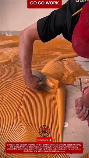 Skilled Technique Spreads Tile Adhesive Evenly with Clean Patterns