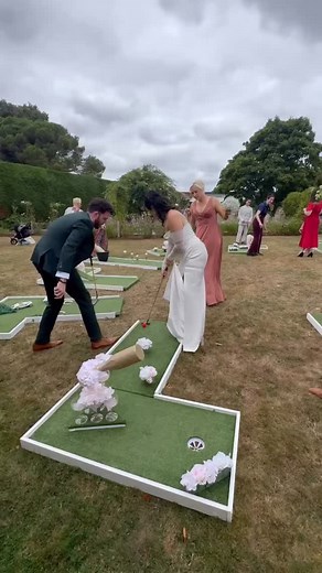 Why not have a ParTee like this fabulous couple enjoying the wedding mini golf. Love, laughter, and a little friendly competition 💕Mini golf can make your wedding day even more unforgettable! #minigolf #WeddingFun #2026wedding #weddingentertainment #weddingfun #weddingminigolf #WeddingPhotography #2026bride #funweddingideas | Par-Tee Events