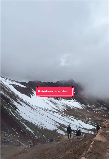 Exploring the Wonders of Vinicunca in Rough Weather