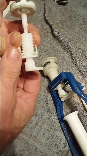 Repairing a stuck toilet button