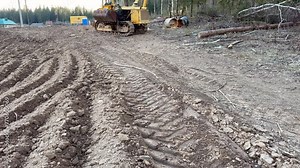 Natural Gas Pipeline Construction site, pipelayer. Transmission in pipe to LNG plant. Building of transit petrochemical pipe in field. Transports crude oil, natural gas, petroleum