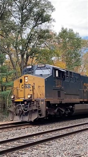 A friendly crew pilots M436 past nice fall colors