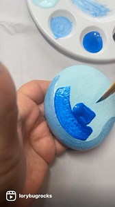 Let’s paint a pretty winter snail bug. I am obsessed with the metallic blue on this bug. #artreels #rockpainting #paintwithme #CraftyCreations #paintedrocks #handmade #crafting #lorybugrocks #artreel #craftsupplies #metallicpaint #handpainted #christmascrafts | Lorybugrocks