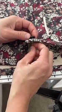 How to add buttons to two sides of a garment