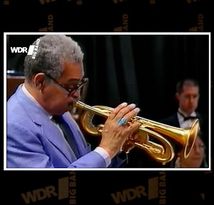 47K views · 1.3K reactions | BIlly Strayhorn's "Take The A Train" is indubitably one of the most well known jazz tunes of all time. This version is an arrangement by Bill Dobbins, featuring Art Farmer on Flumpet, as well as the King's Singers. | WDR Big Band | Facebook