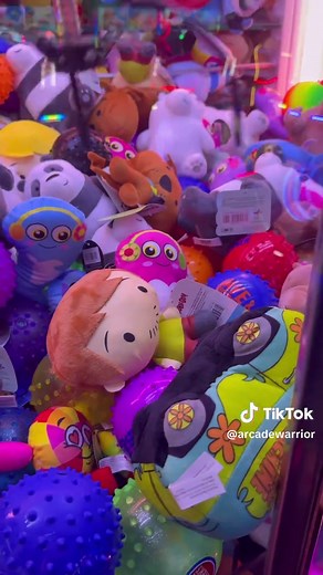 Claw Machine Challenge at Dave & Busters