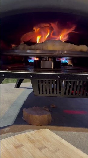 Rotating stone = evenly baked pizza without babysitting it. Bertello SimulFIRE Pizza Oven