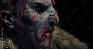 Close up of a scary orc with bloody face, profile shot, realistic fantasy, 4k