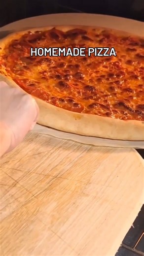 First time cooking Pizza using pizza stone #youtubeshorts #cooking #pizza #baking #pizzalover