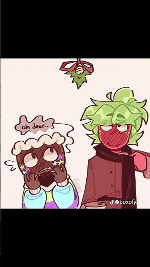 Under the mistletoe cosmo and sprout kiss￼