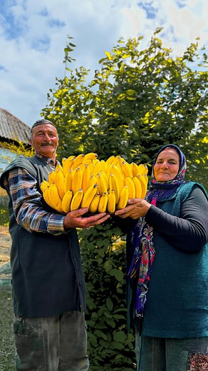 Sweet Village | YouTube Channel 800K+ on Instagram: "Indulge in the simple pleasure of our village-style banana cake recipe. 🍌🥮 Quick, delicious, and perfect for any day. Taste the rustic charm in every bite! 📝 Eggs: 15 Sugar: 750g Water: 240ml Vegetable Oil: 480ml Baking Powder: 15g Vanilla Extract: 15ml Cocoa Powder: 100g Flour: 900g Baking Soda: 7.5 g #outdoorcooking #banana #bananacake #cake #recipe #recipes #campfirecooking #bushcraftcooking #streetfood #cooking #wildcooking #outdoorchef