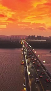 🌉🌆Nanjing Yangtze Bridge glows beneath a blazing red sky. | Lucia studio