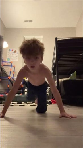 Eight-year-old doing 100 push-ups ￼