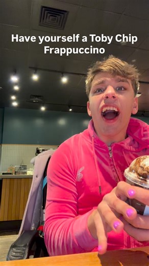 Tobie Smile 🌈🩷 on Instagram: "Sip the joy away ☕✨ Whipped cream swirls, java chip dreams, and Christmas cheer all in one cup 🎄💖 It’s not just a drink, it’s a whole mood — have yourself a Tobie Chip Frappuccino now 💅🎶 #TobieChipFrappuccino #StarbucksSeason #GayAndCute #BabeacinoVibes #BarbieChristmas"