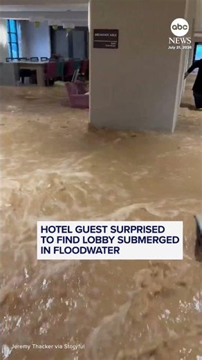 Hotel guest surprised to find lobby submerged in floodwater