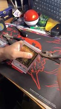 Cracking open a PSA Pokemon Slab vs a CGC Slab! 😱#pokemoncards #pokemon #fyp #trending #shorts