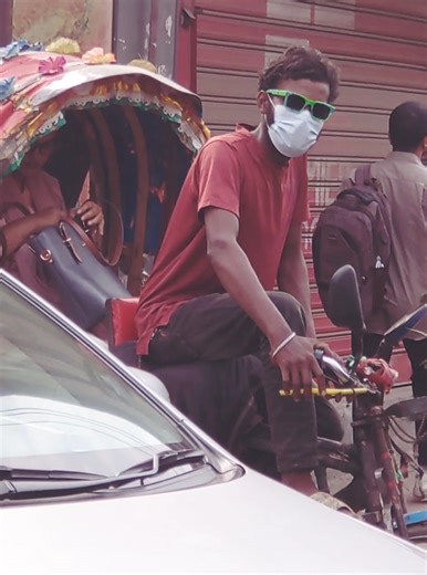 Innovative Bangladeshi Smart Rickshaw Driver