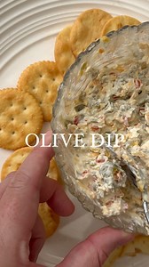 BILL’s OLIVE DIP 🫒 Olive Lovers - this is for us! My father in law, Bill, made this for the weekly family Sunday Lunch (where he also makes his famous Sunday Sauce that simmers for 8 hours 😍) AND I COULD NOT STOP EATING IT. It doesn’t get easier or more delicious than this. Thanks Bill! We love ya 🤌🏼 INGREDIENTS: 9 ounce jar green pimento olives, diced 8 ounces cream cheese, softened 1/2 cup Mayo 1 cup shredded cheddar cheese 1/2 teaspoon garlic powder 1 tablespoon olive brine from jar of ol