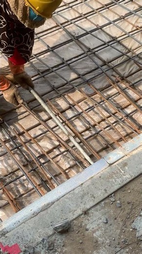 Traditional Slab Rebar Bending Techniques on Construction Site