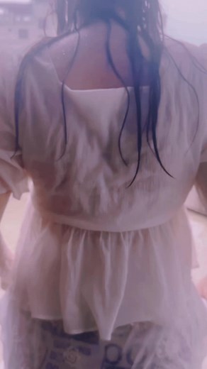 Dancing in the Rain on a Rooftop Garden