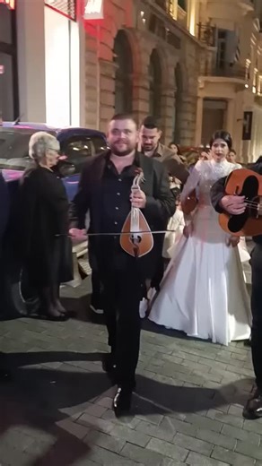 Nikos Koniotakis on Instagram: "Traditional Cretan wedding in Agios Titos church in Heraklion's center! 🇬🇷 ⛪ The bride walks to the church accompanied by her father and brother, her family and friends. 💍 🎉 Grigoris Samolis and his band play Lyra and lute, singing a wedding song! 🎵 Once they reach the church, the father hands the bride over to the groom! 👰🤵 You are welcome to comment, share and join our groups about Crete at: https://www.facebook.com/groups/1294583267926764/?ref=share http