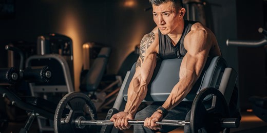 Try a Preacher Curl Machine To Build Bigger Biceps | Men’s Health Muscle