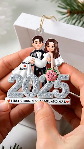 97 reactions · 14 shares | New name, same love — our first Christmas together, Celebrate your first holiday as a married couple with this shining ornament. ✨ Order here: sunrais.com/251113-4 | Sunrais | Facebook
