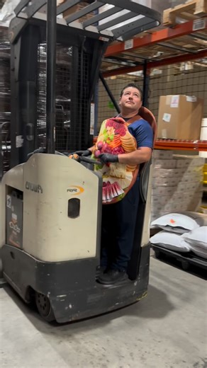 Just another day at Gourmet Foods International, featuring a charcuterie board costume, of course. 🎃 Happy Halloween from our team! | Gourmet Foods International
