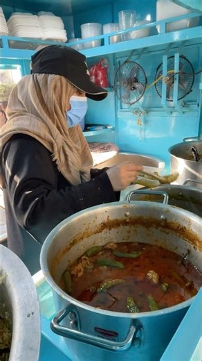 Hardworking lady selling home made desi food in Peshawar #streetfood