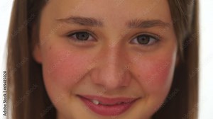 Closeup face portrait of a pretty young girl