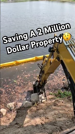 Caterpillar 305E2 | Installing Rip Rap Shoreline Erosion