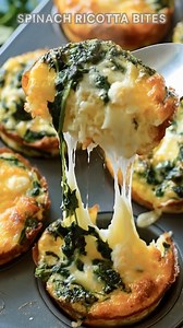 Spinach folded with ricotta. Sprinkle salt, garlic, Parmesan. Bake at 350°F for 20–25 minutes. These bites turn warm, golden, and tender with cheesy, savory goodness in every mini muffin. Ingredients ➤ 2 tbsp unsalted butter ➤ 1 small yellow onion, finely chopped ➤ 1 garlic clove, minced ➤ 2 large eggs, lightly beaten ➤ 1 cup ricotta cheese ➤ 1/2 cup shredded mozzarella cheese ➤ 1/2 cup grated Parmesan cheese ➤ 10 oz frozen chopped spinach, thawed and well-drained FULLL Recipe in First Cօʍʍеոτ �