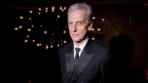 Watch Doctor Who and The Thick Of It legend Peter Capaldi perform a surprise cover of one of The Cure's best-loved songs at his first ever solo show