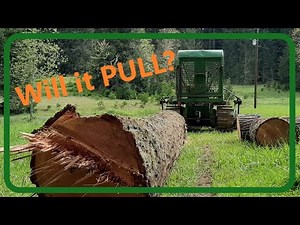John Deere 420 crawler/Pulling Big Wood!