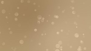 Dark beige bokeh gradient motion background loop.